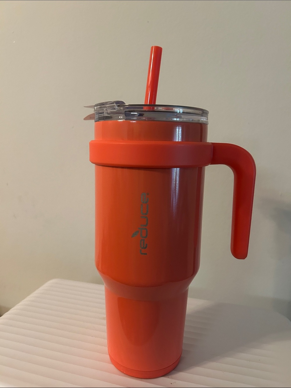 Reduce Insulated coral Travel Tumbler with Handle and Straw